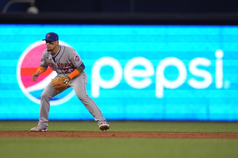 Aug 5, 2021; Miami, Florida, USA; New York Mets shortstop Javier Baez (23) fields his position in the game against the Miami Marlins at loanDepot park. Mandatory Credit: Jasen Vinlove-USA TODAY Sports