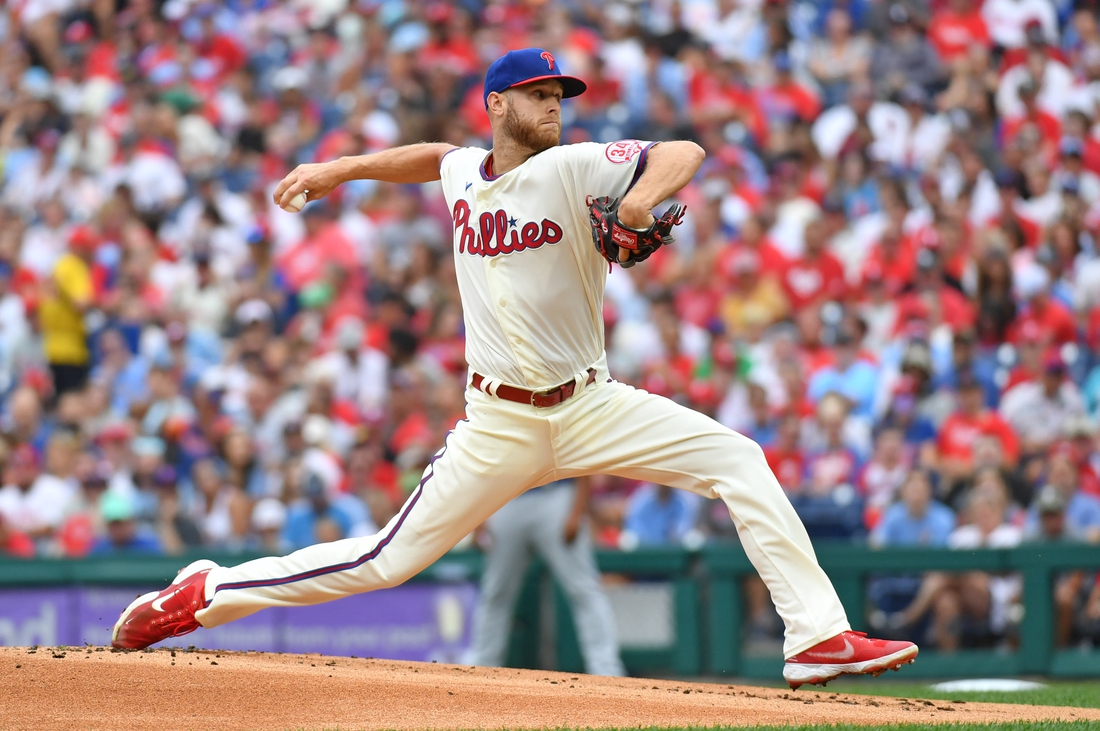 Aug 8, 2021; Philadelphia, Pennsylvania, USA; Philadelphia Phillies starting pitcher Zack Wheeler (45) throws a pitch against the New York Mets during the first inning at Citizens Bank Park. Mandatory Credit: Eric Hartline-USA TODAY Sports