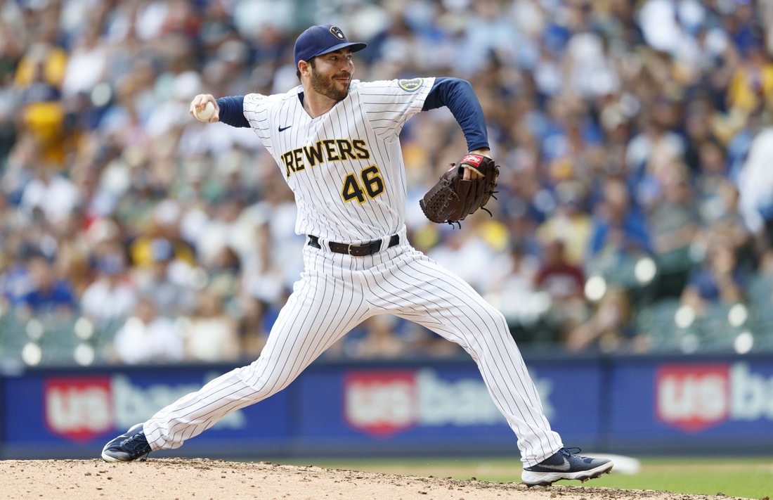 Aug 8, 2021; Milwaukee, Wisconsin, USA;  Milwaukee Brewers pitcher John Curtiss (46) throws a pitch during the sixth inning against the San Francisco Giants at American Family Field. Mandatory Credit: Jeff Hanisch-USA TODAY Sports