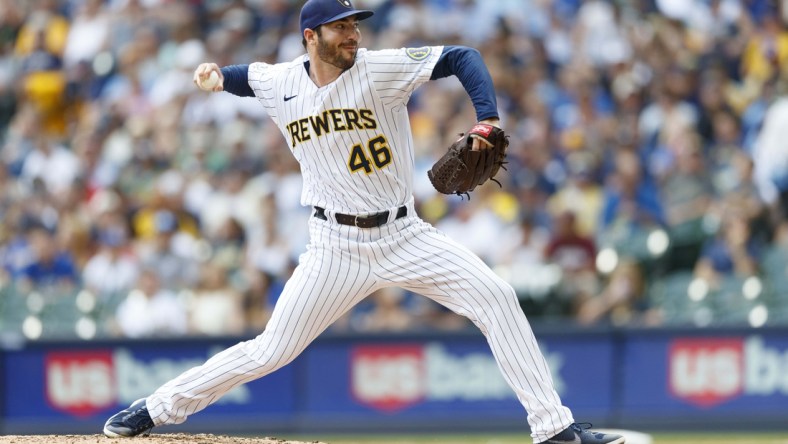 Aug 8, 2021; Milwaukee, Wisconsin, USA;  Milwaukee Brewers pitcher John Curtiss (46) throws a pitch during the sixth inning against the San Francisco Giants at American Family Field. Mandatory Credit: Jeff Hanisch-USA TODAY Sports