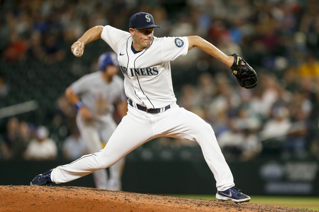 Aug 10, 2021; Seattle, Washington, USA; Seattle Mariners relief pitcher Paul Sewald (37) throws against the Texas Rangers during the ninth inning at T-Mobile Park. Mandatory Credit: Joe Nicholson-USA TODAY Sports