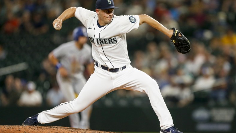 Aug 10, 2021; Seattle, Washington, USA; Seattle Mariners relief pitcher Paul Sewald (37) throws against the Texas Rangers during the ninth inning at T-Mobile Park. Mandatory Credit: Joe Nicholson-USA TODAY Sports