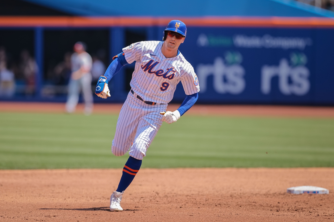 Aug 12, 2021; New York City, NY, USA; New York Mets center fielder Brandon Nimmo (9) rounds second base after hitting a three run home run during the second inning against the Washington Nationals at Citi Field. Mandatory Credit: Vincent Carchietta-USA TODAY Sports