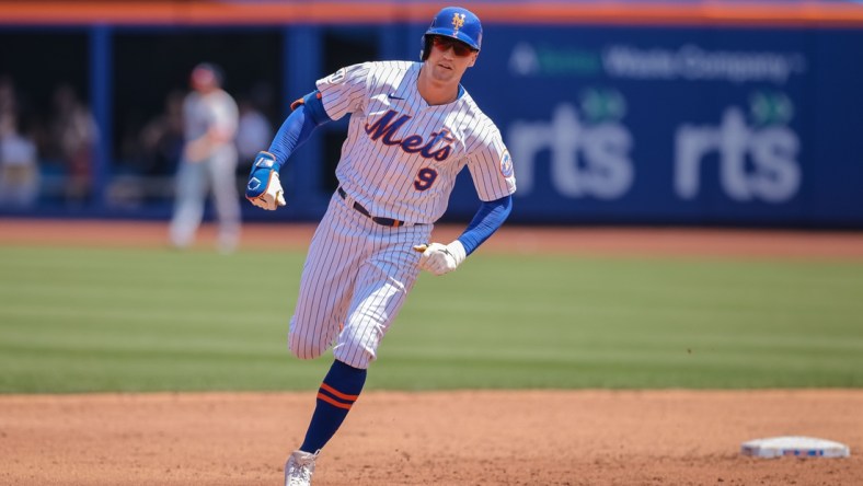 Aug 12, 2021; New York City, NY, USA; New York Mets center fielder Brandon Nimmo (9) rounds second base after hitting a three run home run during the second inning against the Washington Nationals at Citi Field. Mandatory Credit: Vincent Carchietta-USA TODAY Sports