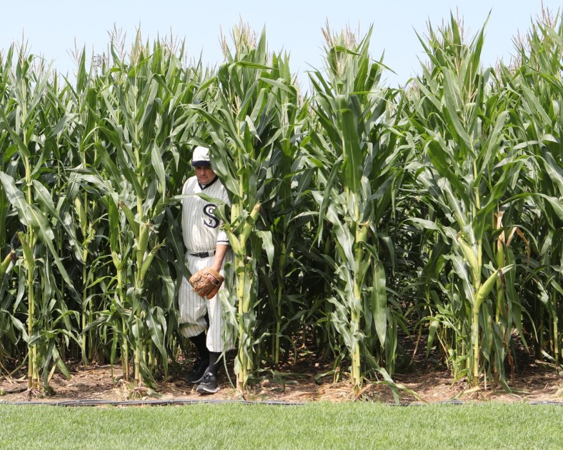 Aug 12, 2021; Dyersville, Iowa, USA; John Sutter of Dubuque, Iowa, exits the cornstalk at the original movie site before the game between the Chicago White Sox and the New York Yankees at the Field of Dreams. John has been a member of the  ghost players  team for over 10 years.   Mandatory Credit: Reese Strickland-USA TODAY Sports
