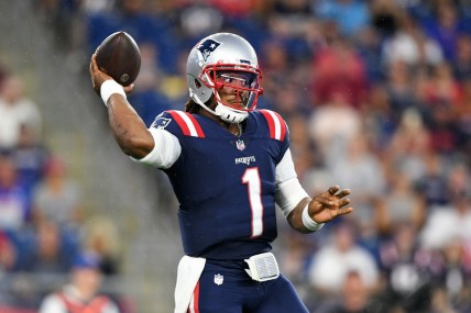 Aug 12, 2021; Foxborough, Massachusetts, USA; New England Patriots quarterback Cam Newton (1) throws the ball during the first half of a game against the Washington Football Team at Gillette Stadium. Mandatory Credit: Brian Fluharty-USA TODAY Sports