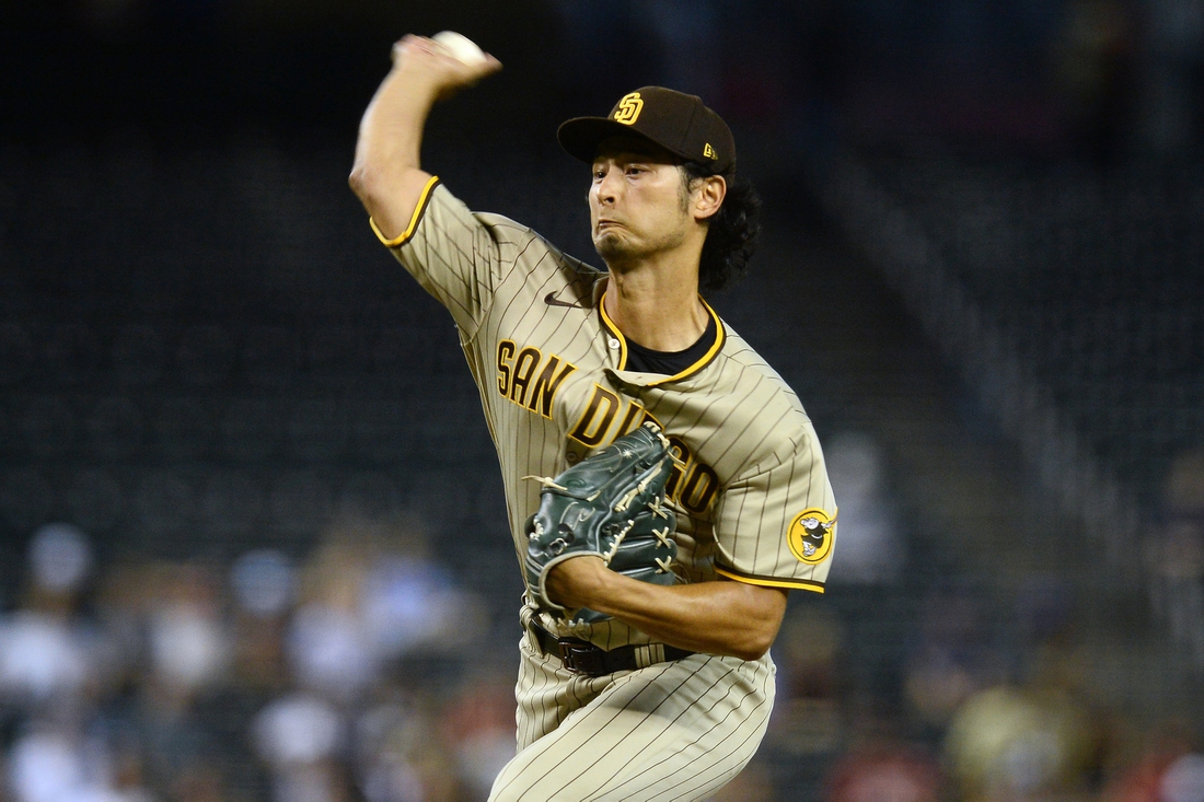 Aug 12, 2021; Phoenix, Arizona, USA; San Diego Padres pitcher Yu Darvish (11) throws against the Arizona Diamondbacks during the first inning at Chase Field. Mandatory Credit: Joe Camporeale-USA TODAY Sports