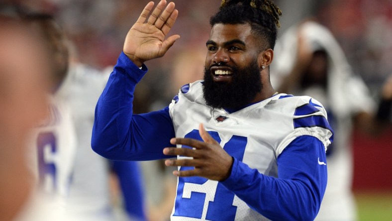 Aug 13, 2021; Glendale, Arizona, USA; Dallas Cowboys running back Ezekiel Elliott (21) looks on against the Arizona Cardinals during the second half of a preseason game at State Farm Stadium. Mandatory Credit: Joe Camporeale-USA TODAY Sports