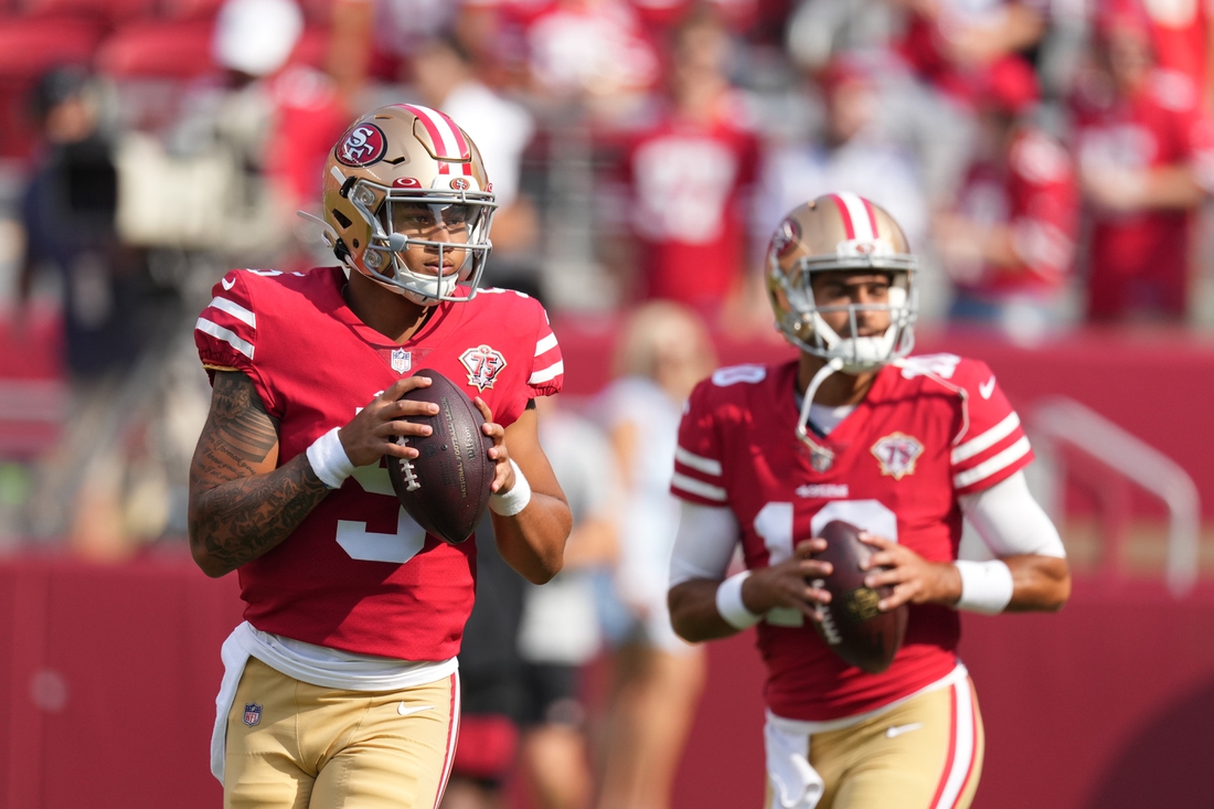 August 14, 2021; Santa Clara, California, USA; San Francisco 49ers quarterback Trey Lance (5) and quarterback Jimmy Garoppolo (10) warm up before the game against the Kansas City Chiefs at Levi