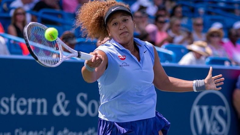 Naomi Osaka of Japan makes a hit to Cori Gauff of the United States during the Western & Southern Open at the Lindner Family Tennis Center Wednesday, August 18, 2021.

Naomi Coco4