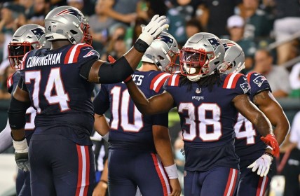 Aug 19, 2021; Philadelphia, Pennsylvania, USA; New England Patriots running back Rhamondre Stevenson (38) celebrates with offensive tackle Korey Cunningham (74)  after scoring a touchdown against the Philadelphia Eagles during the second quarter at Lincoln Financial Field. Mandatory Credit: Eric Hartline-USA TODAY Sports