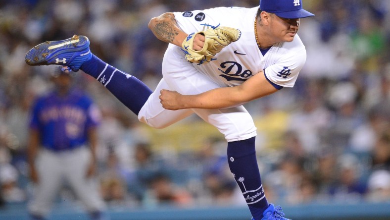 Aug 19, 2021; Los Angeles, California, USA; Los Angeles Dodgers relief pitcher Victor Gonzalez (81) throws against the New York Mets during the fifth inning at Dodger Stadium. Mandatory Credit: Gary A. Vasquez-USA TODAY Sports