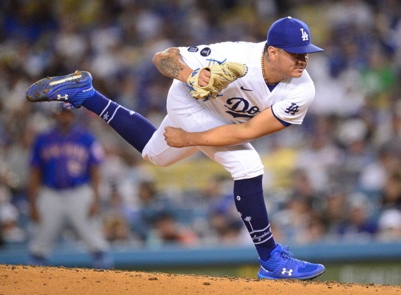 Aug 19, 2021; Los Angeles, California, USA; Los Angeles Dodgers relief pitcher Victor Gonzalez (81) throws against the New York Mets during the fifth inning at Dodger Stadium. Mandatory Credit: Gary A. Vasquez-USA TODAY Sports