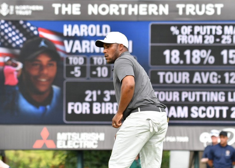 Aug 20, 2021; Jersey City, New Jersey, USA; Harold Varner III watches his putt on the 15th hole during the second round of The Northern Trust golf tournament at the Liberty National Golf Club. Mandatory Credit: Mark Konezny-USA TODAY Sports