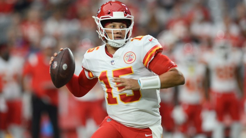 Aug 20, 2021; Glendale, Arizona, USA; Kansas City Chiefs quarterback Patrick Mahomes (15) drops back to pass during the first half against the Arizona Cardinals at State Farm Stadium. Mandatory Credit: Joe Camporeale-USA TODAY Sports