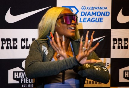 Sha'Carri Richardson strikes a pose at the Prefontaine Class press conference in Eugene Friday as she prepares to compete in a loaded women's 100 meters at Hayward Field.

Eug 082021 Richardson 02