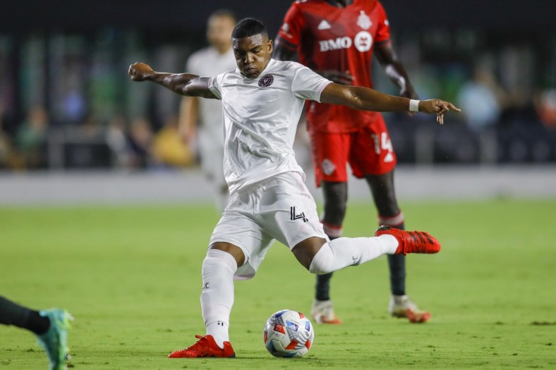 Aug 21, 2021; Fort Lauderdale, FL, Fort Lauderdale, FL, USA; Inter Miami CF defender Christian Makoun (4) attempts a shot during the first half of the game against Toronto FC at DRV PNK Stadium. Mandatory Credit: Sam Navarro-USA TODAY Sports