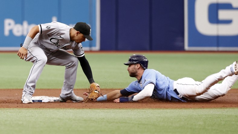 Aug 22, 2021; St. Petersburg, Florida, USA; Chicago White Sox second baseman Cesar Hernandez (12) tags to Tampa Bay Rays center fielder Kevin Kiermaier (39) as he attempted to steal second base during the third inning at Tropicana Field. Mandatory Credit: Kim Klement-USA TODAY Sports