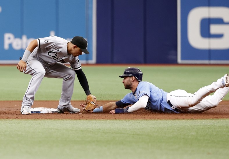 Aug 22, 2021; St. Petersburg, Florida, USA; Chicago White Sox second baseman Cesar Hernandez (12) tags to Tampa Bay Rays center fielder Kevin Kiermaier (39) as he attempted to steal second base during the third inning at Tropicana Field. Mandatory Credit: Kim Klement-USA TODAY Sports