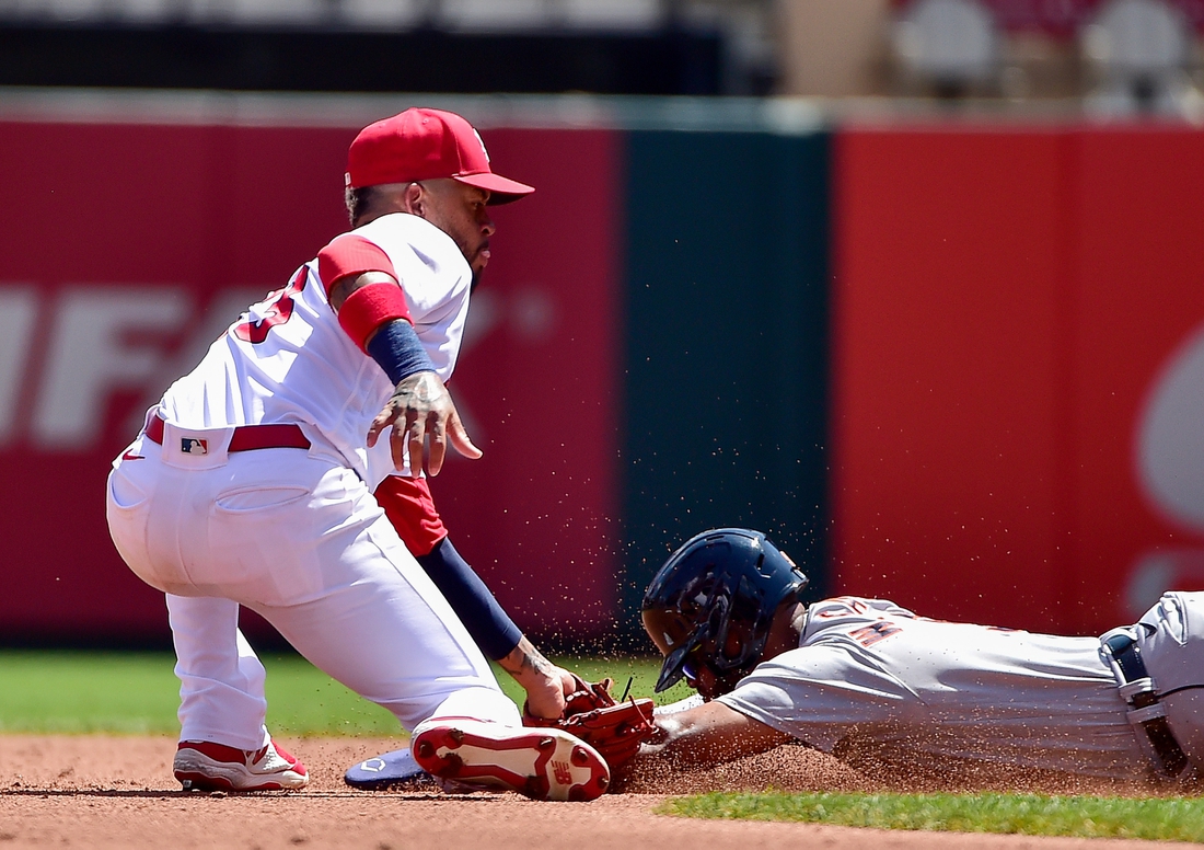 Aug 25, 2021; St. Louis, Missouri, USA;  St. Louis Cardinals second baseman Edmundo Sosa (63) tags out Detroit Tigers second baseman Willi Castro (9) as he attempt to steal second during the second inning at Busch Stadium. Mandatory Credit: Jeff Curry-USA TODAY Sports