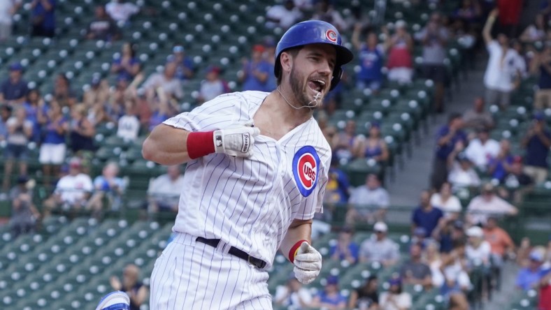 Aug 25, 2021; Chicago, Illinois, USA; Chicago Cubs third baseman Patrick Wisdom (16) runs the bases after hitting a three run home run against the Colorado Rockies during the fifth inning in game one of a doubleheader at Wrigley Field. Mandatory Credit: David Banks-USA TODAY Sports