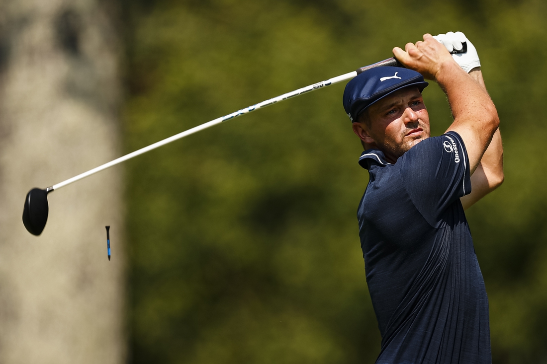 Aug 27, 2021; Owings Mills, Maryland, USA; Bryson Dechambeau plays his shot from the second tee during the second round of the BMW Championship golf tournament. Mandatory Credit: Scott Taetsch-USA TODAY Sports