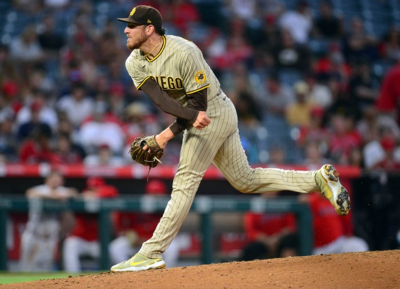 Aug 27, 2021; Anaheim, California, USA; San Diego Padres starting pitcher Joe Musgrove (44) throws against the Los Angeles Angels during the second inning at Angel Stadium. Mandatory Credit: Gary A. Vasquez-USA TODAY Sports