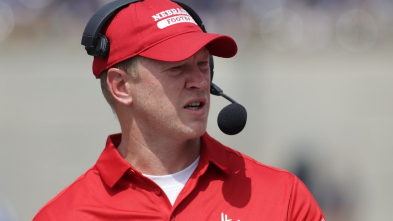 Aug 28, 2021; Champaign, Illinois, USA; Nebraska head coach Scott Frost watches his team in the first quarter with Illinois at Memorial Stadium. Mandatory Credit: Ron Johnson-USA TODAY Sports