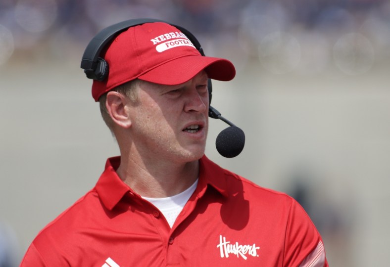 Aug 28, 2021; Champaign, Illinois, USA; Nebraska head coach Scott Frost watches his team in the first quarter with Illinois at Memorial Stadium. Mandatory Credit: Ron Johnson-USA TODAY Sports