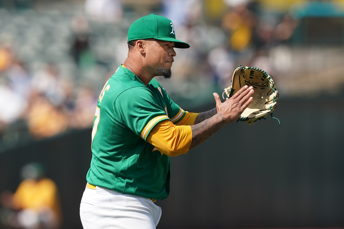 Aug 28, 2021; Oakland, California, USA; Oakland Athletics starting pitcher Frankie Montas (47) reacts to an inning-ending double play during the seventh inning against the New York Yankees at RingCentral Coliseum. Mandatory Credit: Darren Yamashita-USA TODAY Sports