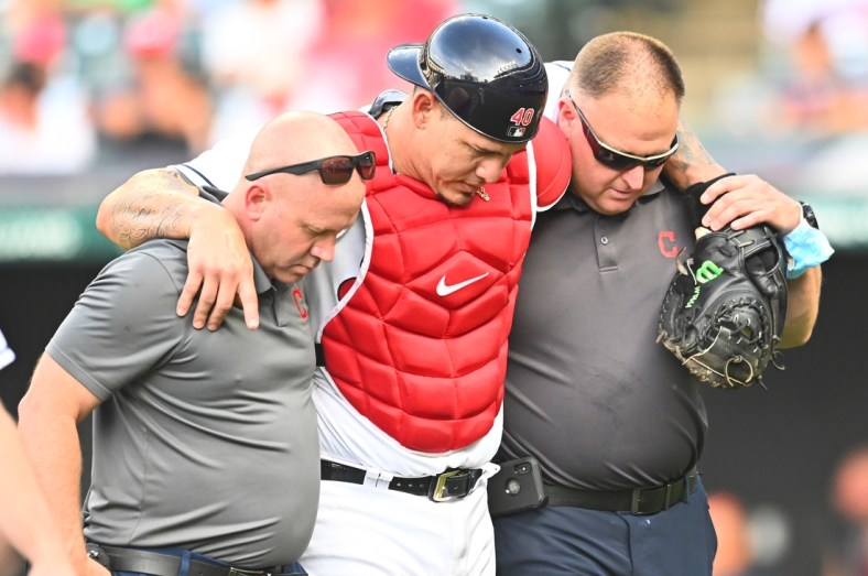 Aug 28, 2021; Cleveland, Ohio, USA; Cleveland Indians catcher Wilson Ramos (40) is helped from the field after being injured during the seventh inning against the Boston Red Sox at Progressive Field. Mandatory Credit: Ken Blaze-USA TODAY Sports