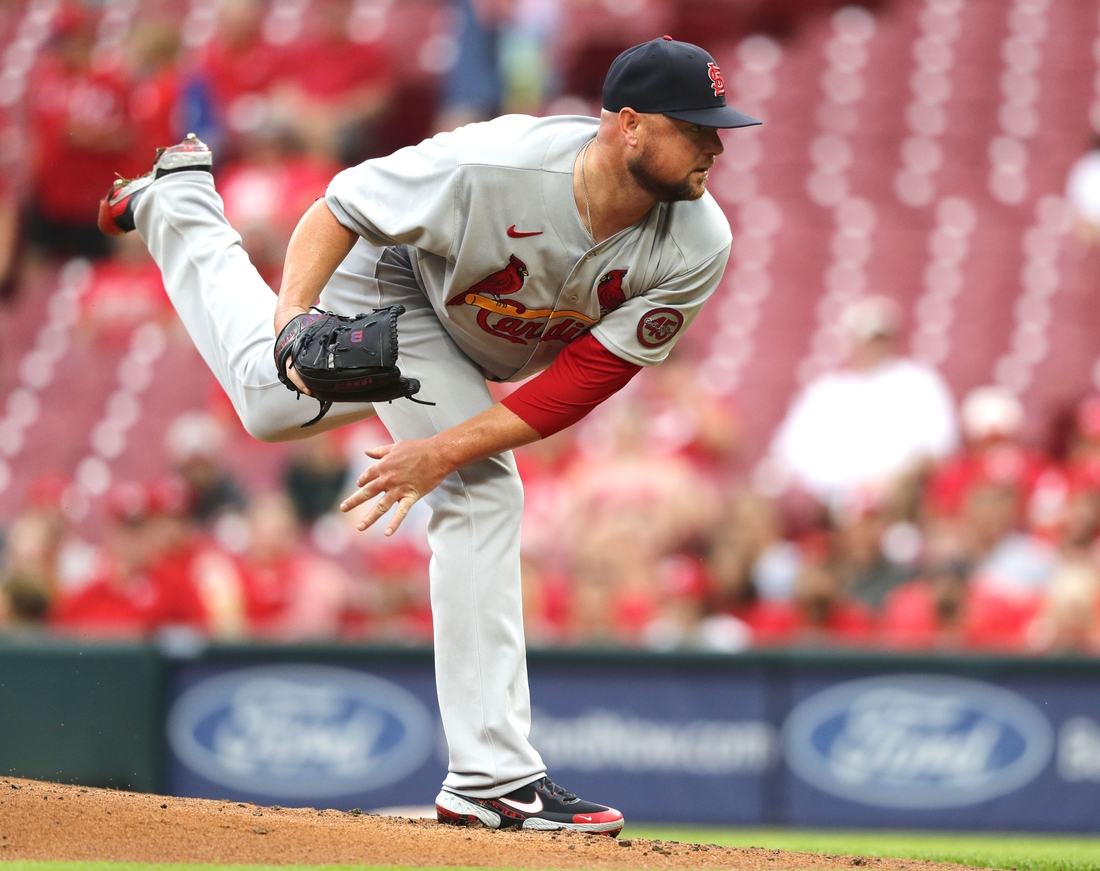 Aug 30, 2021; Cincinnati, Ohio, USA; St. Louis Cardinals starting pitcher Jon Lester (31) releases a pitch against the Cincinnati Reds during the first inning at Great American Ball Park. Mandatory Credit: David Kohl-USA TODAY Sports