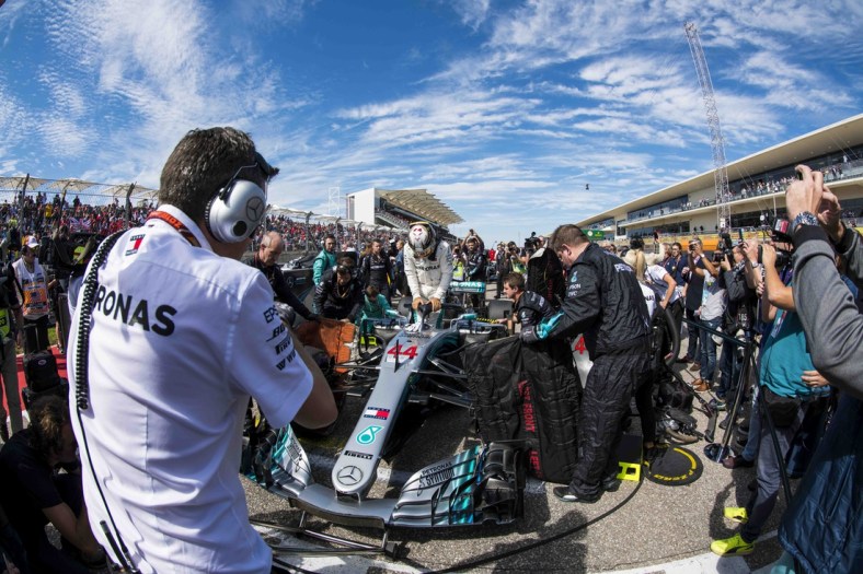 Oct 21, 2018; Austin, TX, USA; Mercedes driver Lewis Hamilton (44) of Great Britain exits his car before the start of the United States Grand Prix at Circuit of the Americas. Mandatory Credit: Jerome Miron-USA TODAY Sports