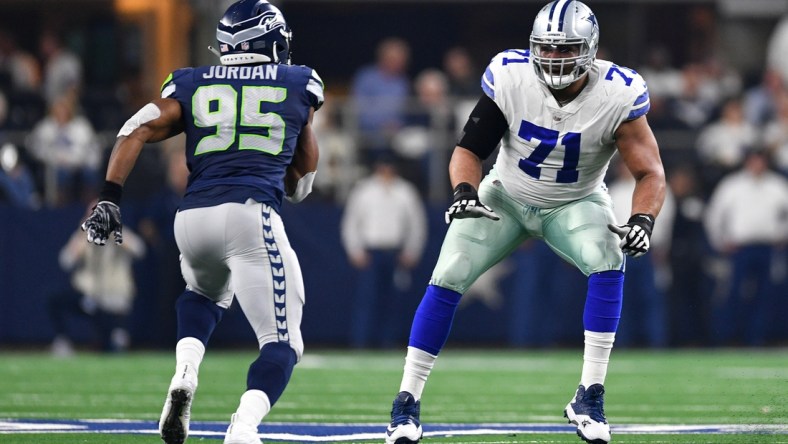 Jan 5, 2019; Arlington, TX, USA; Dallas Cowboys offensive tackle La'el Collins (71) pass protects against Seattle Seahawks defensive end Dion Jordan (95) in the second quarter in a NFC Wild Card playoff football game at AT&T Stadium. Mandatory Credit: Shane Roper-USA TODAY Sports