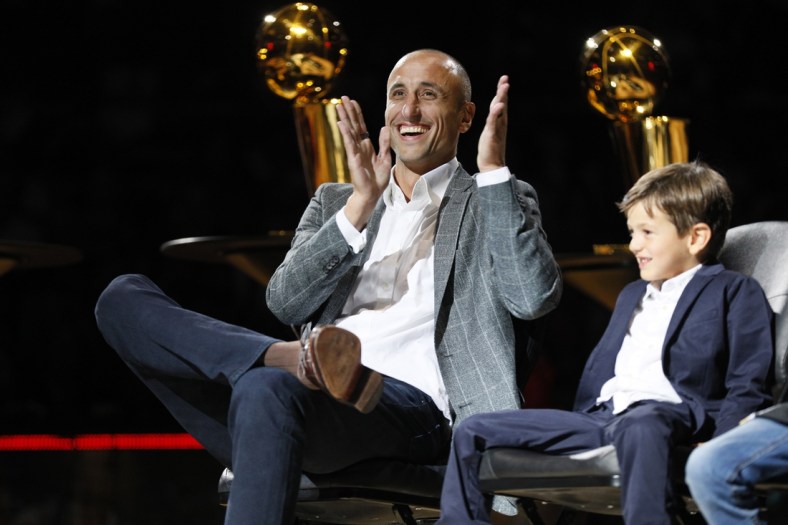 Mar 28, 2019; San Antonio, TX, USA; San Antonio Spurs former player Manu Ginobili reacts during his jersey retirement ceremony at AT&T Center after a game between the Cleveland Cavaliers and San Antonio Spurs. Mandatory Credit: Soobum Im-USA TODAY Sports