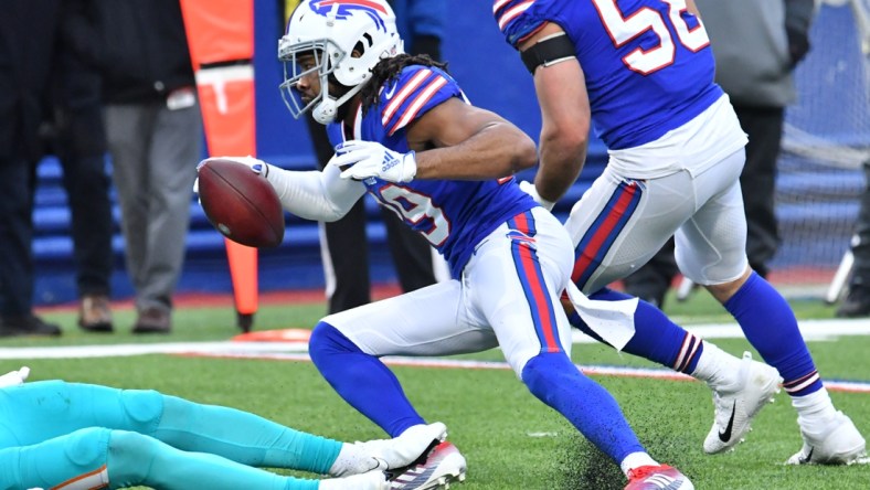 Jan 3, 2021; Orchard Park, New York, USA; Buffalo Bills cornerback Josh Norman (29) returns an interception against the Miami Dolphins in the third quarter at Bills Stadium. Mandatory Credit: Mark Konezny-USA TODAY Sports