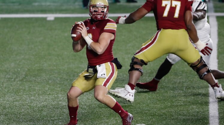 Nov 28, 2020; Chestnut Hill, Massachusetts, USA; Boston College Eagles quarterback Dennis Grosel (6) looks to pass against the Louisville Cardinals during the second half at Alumni Stadium. Mandatory Credit: Winslow Townson-USA TODAY Sports