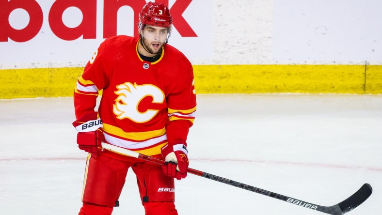 Feb 19, 2021; Calgary, Alberta, CAN; Calgary Flames defenseman Connor Mackey (3) skates against the Edmonton Oilers during the first period at Scotiabank Saddledome. Mandatory Credit: Sergei Belski-USA TODAY Sports