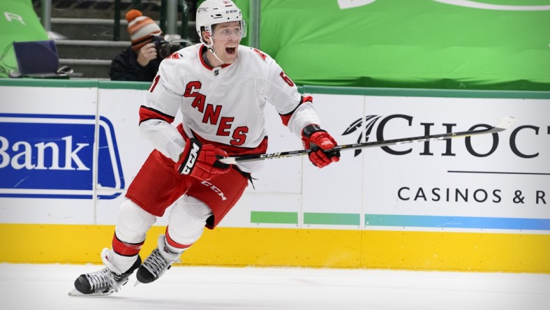 Feb 13, 2021; Dallas, Texas, USA; Carolina Hurricanes defenseman Jake Gardiner (51) in action during the game between the Dallas Stars and the Carolina Hurricanes at the American Airlines Center. Mandatory Credit: Jerome Miron-USA TODAY Sports