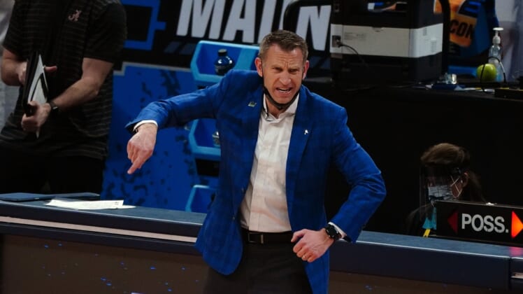 Mar 22, 2021; Indianapolis, Indiana, USA; Alabama Crimson Tide head coach Nate Oats reacts in the first half against the Maryland Terrapins in the second round of the 2021 NCAA Tournament at Bankers Life Fieldhouse. Mandatory Credit: Kirby Lee-USA TODAY Sports