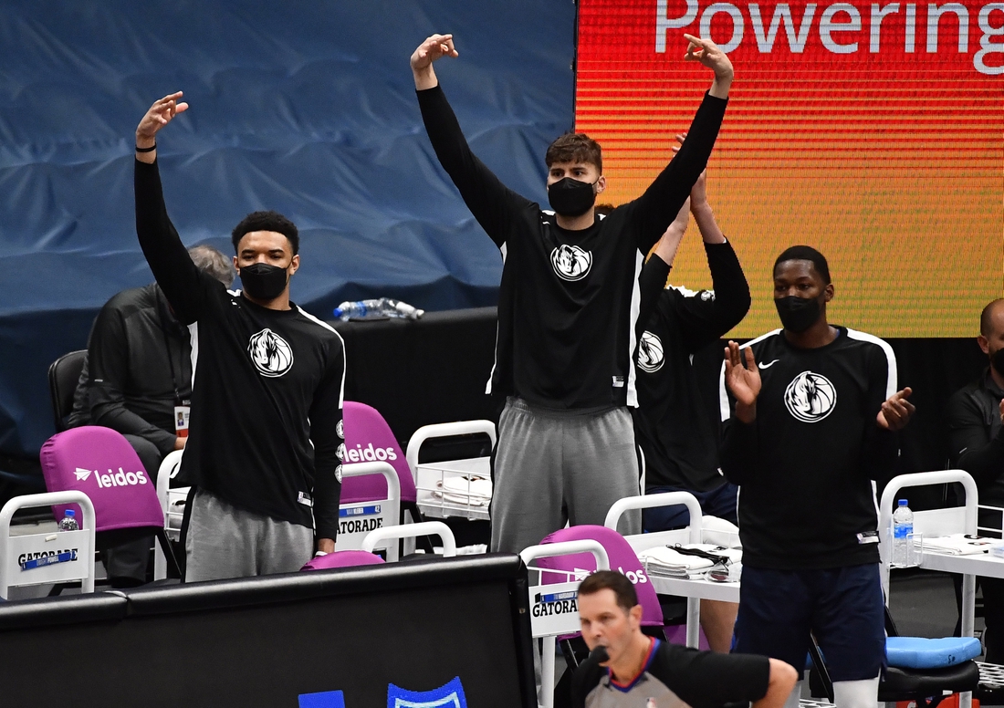 Apr 3, 2021; Washington, District of Columbia, USA; Dallas Mavericks players react on the bench during the first quarter against the Washington Wizards at Capital One Arena. Mandatory Credit: Brad Mills-USA TODAY Sports