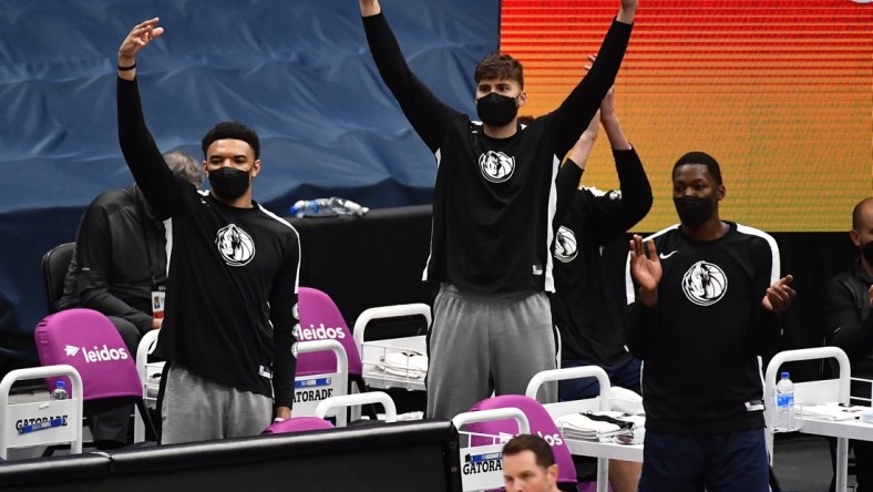 Apr 3, 2021; Washington, District of Columbia, USA; Dallas Mavericks players react on the bench during the first quarter against the Washington Wizards at Capital One Arena. Mandatory Credit: Brad Mills-USA TODAY Sports