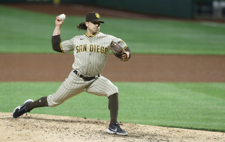 Apr 13, 2021; Pittsburgh, Pennsylvania, USA;  San Diego Padres relief pitcher Taylor Williams (45) pitches against the Pittsburgh Pirates during the seventh inning at PNC Park. Mandatory Credit: Charles LeClaire-USA TODAY Sports