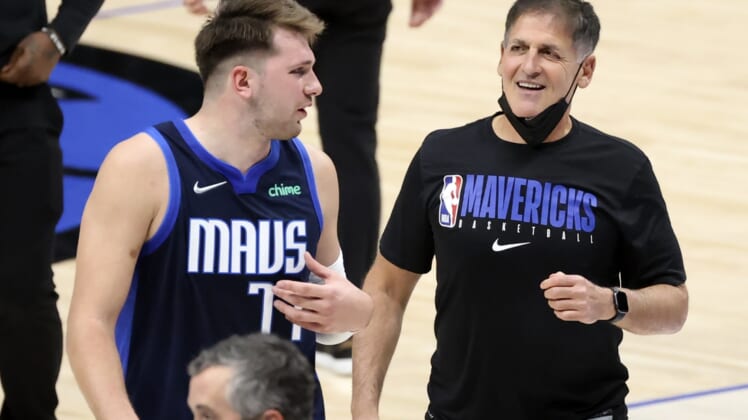 Apr 21, 2021; Dallas, Texas, USA;  Dallas Mavericks guard Luka Doncic (77) laughs with owner Mark Cuban after the game against the Detroit Pistons at American Airlines Center. Mandatory Credit: Kevin Jairaj-USA TODAY Sports