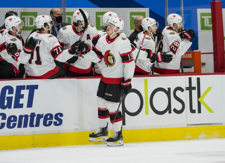 Apr 22, 2021; Vancouver, British Columbia, CAN; Ottawa Senators forward Drake Batherson (19) celebrates his goal against the Vancouver Canucks  in the first period at Rogers Arena. Mandatory Credit: Bob Frid-USA TODAY Sports