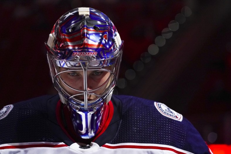 May 1, 2021; Raleigh, North Carolina, USA;  Columbus Blue Jackets goaltender Elvis Merzlikins (90) gets ready for the start of the third period against the Carolina Hurricanes at PNC Arena. Mandatory Credit: James Guillory-USA TODAY Sports