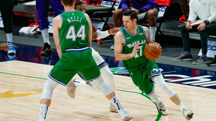 May 2, 2021; Dallas, Texas, USA; Dallas Mavericks guard JJ Redick (17) dribbles around a screen during the third quarter against the Sacramento Kings at American Airlines Center. Mandatory Credit: Andrew Dieb-USA TODAY Sports