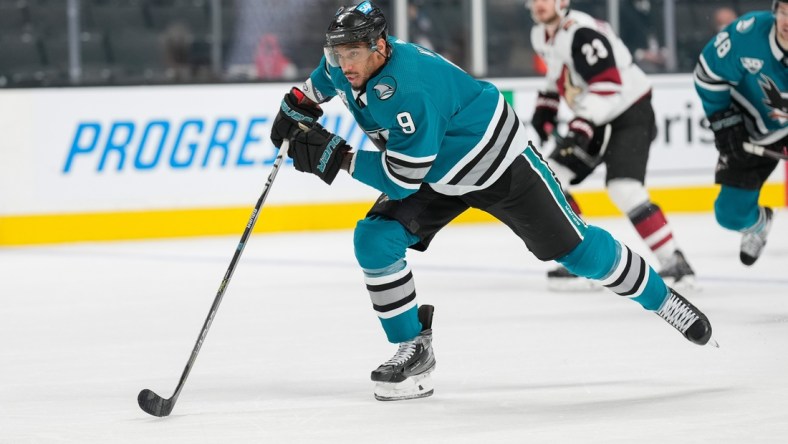 May 7, 2021; San Jose, California, USA; San Jose Sharks left wing Evander Kane (9) skates during the third period against the Arizona Coyotes at SAP Center at San Jose. Mandatory Credit: Stan Szeto-USA TODAY Sports