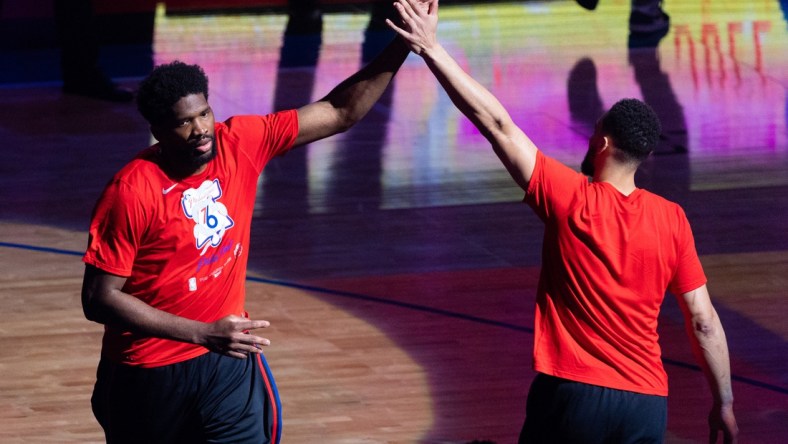 May 23, 2021; Philadelphia, Pennsylvania, USA; Philadelphia 76ers center Joel Embiid (L) and guard Ben Simmons (R) before game one in the first round of the 2021 NBA Playoffs against the Washington Wizards at Wells Fargo Center. Mandatory Credit: Bill Streicher-USA TODAY Sports