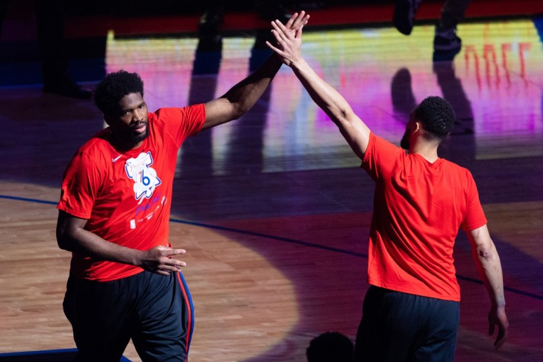 May 23, 2021; Philadelphia, Pennsylvania, USA; Philadelphia 76ers center Joel Embiid (L) and guard Ben Simmons (R) before game one in the first round of the 2021 NBA Playoffs against the Washington Wizards at Wells Fargo Center. Mandatory Credit: Bill Streicher-USA TODAY Sports